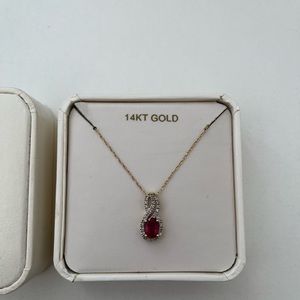 Genuine ruby and diamond pendant necklace on 14k yellow gold chain